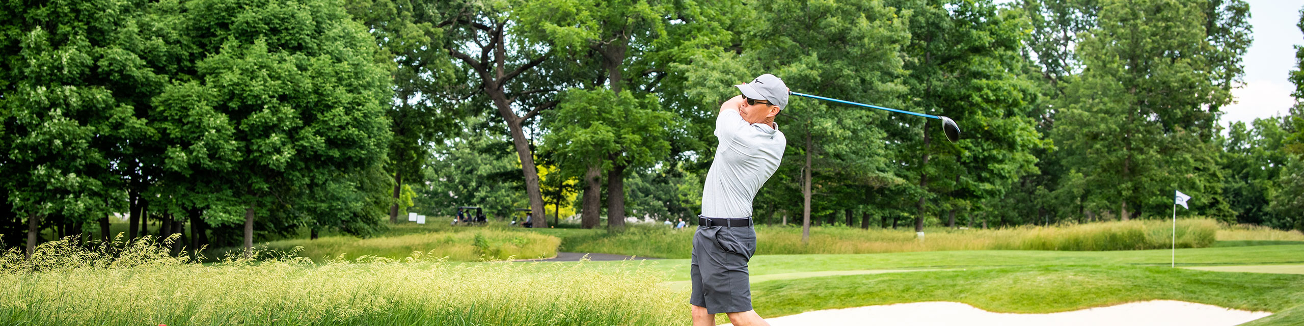 Man golfing.